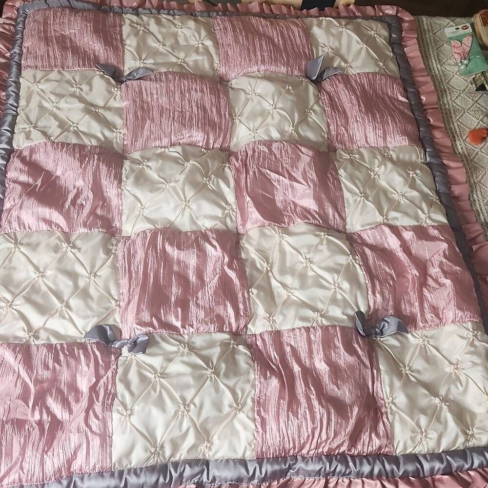 The Peanutshell bella pink patchwork baby quilt